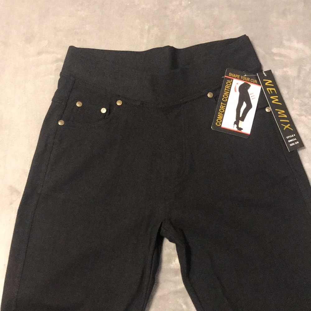 Ladies black jegging. New with tags. Size Small